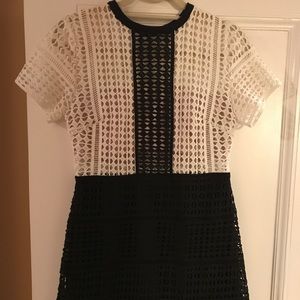 Black and white crocheted mini dress